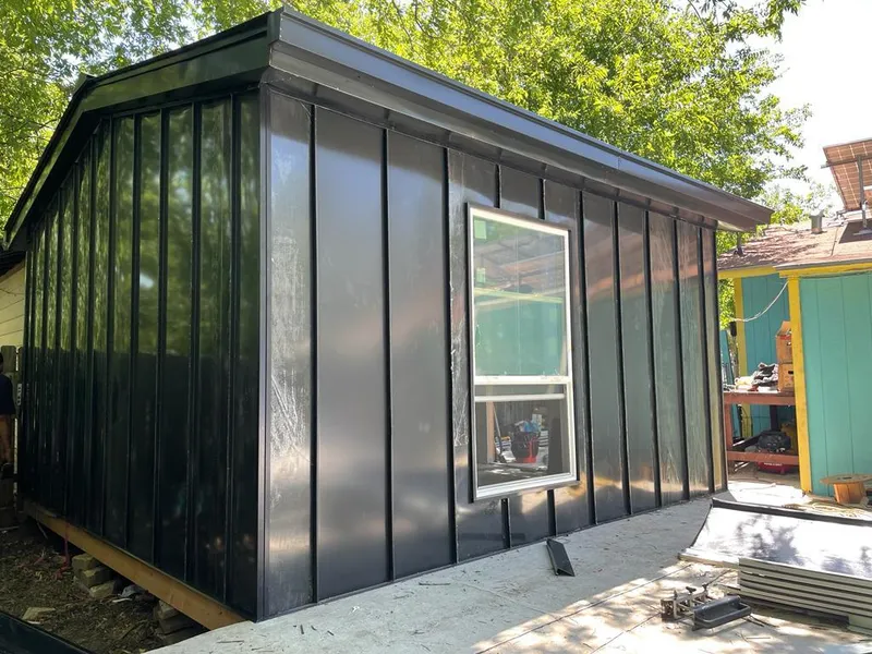 Black standing seam metal wall panels for Metal Roof Installation in Pottsville